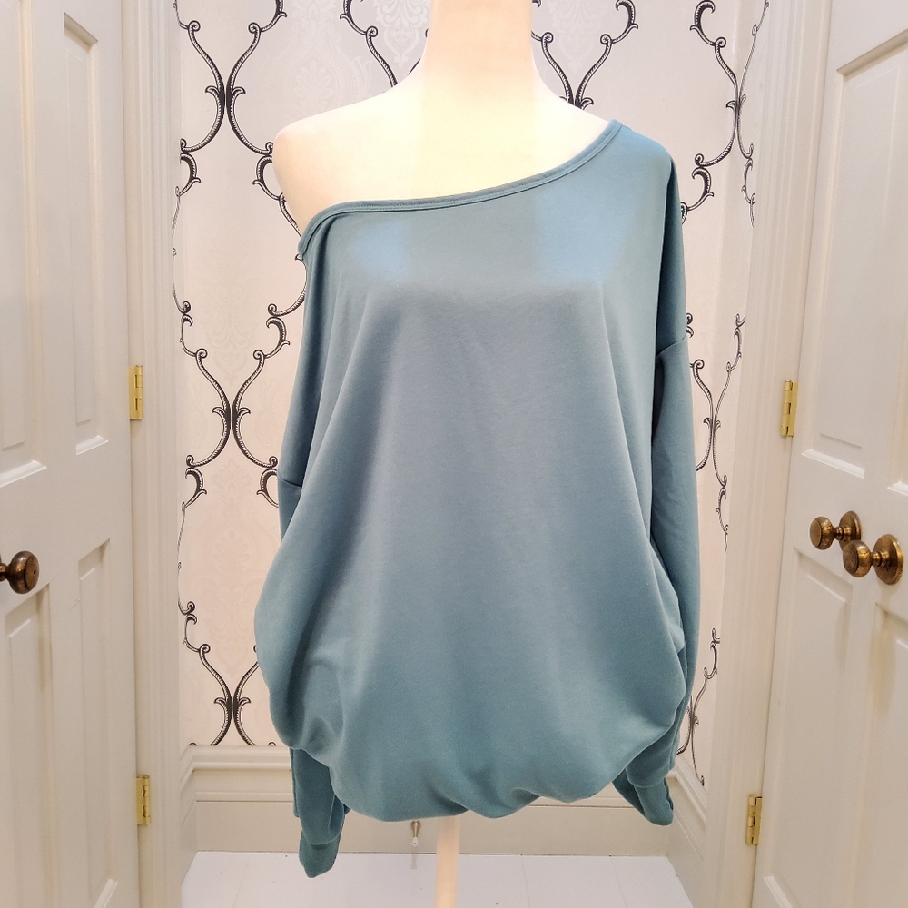Off-shoulder blue long sleeve sweater. NEW without tags. XL